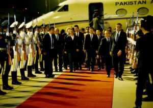 Caretaker PM arrives in Beijing to red carpet welcome