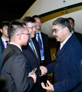 Caretaker PM arrives in Beijing to red carpet welcome
