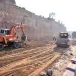 Heavy machinery being used for extension work of Islamabad Expressway during development work in Federal Capital.