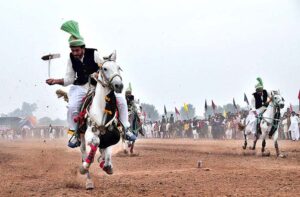 Horse riders are participating in Tent-Pegging competition organized by Qutab Shahi Awan Tent Pegging Club Soon Valley at Mela Mandi ground. 