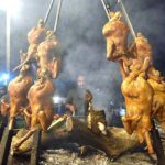 A vendor busy in preparing traditional food item “sajji” to attract the customers at KhanaPul.