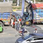 A view of two trucks collide due to over speed at IJP Road in road accident.