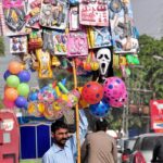A street vendor selling toys at Club Road.