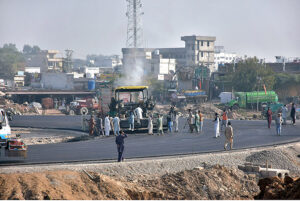 Heavy machinery being used for extension work of Islamabad Expressway during development work in Federal Capital.