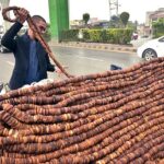 Vendor displaying Fig (Anjeer) to attract customers at roadside.