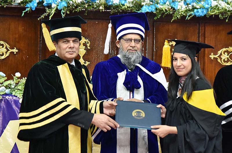 Dr. Sajid Qamar, Rector COMSATS University Islamabad awarding degrees among the successful students during 26th Convocation at Convention Center