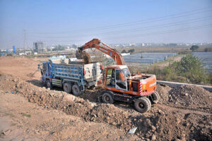 Heavy machinery being used for extension work of Islamabad Expressway during development work in Federal Capital.