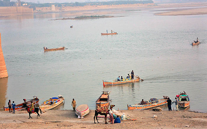 A view of boats parked at Indus River.
