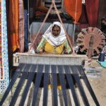 An artisan performing skills and showcasing his work during Ten-Days Folk Festival ‘Lok Mela’ at Lok Virsa