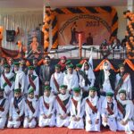 Deputy Commissioner Muhammad Asif Raza in a group photo with students during Annual Sports Gala 2023 organized by District Education Department at Hockey Stadium.
