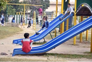 Students enjoying swings at a local park near G-6 area in the Federal Capital.