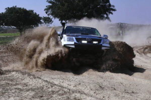 Racer showing his skills in the final round of the 8th Thal Desert Jeep Rally at District Muzaffargarh Organized by the Tourism Development Corporation of Punjab
