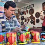 An artisan performing skills and showcasing his work during Ten-Days Folk Festival ‘Lok Mela’ at Lok Virsa