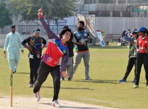 A large number of girls students standing in a queue to register for open trials for the Elite Women's Cricket League under the Lodhran Pilot Project (LPP) at Groundup Academy.