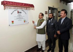 Federal Health Minister Dr. Nadeem Jan inaugurating lab in Khyber Medical University Peshawar