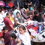People are buying old warm clothes at Empress Road