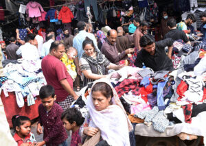 People are buying old warm clothes at Empress Road