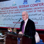 Professor Dr. Herman Vourgh addressing the 3rd international Seerah conference at Women's University Kachehry.