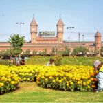 HA workers sowing seasonal flowers in a local park