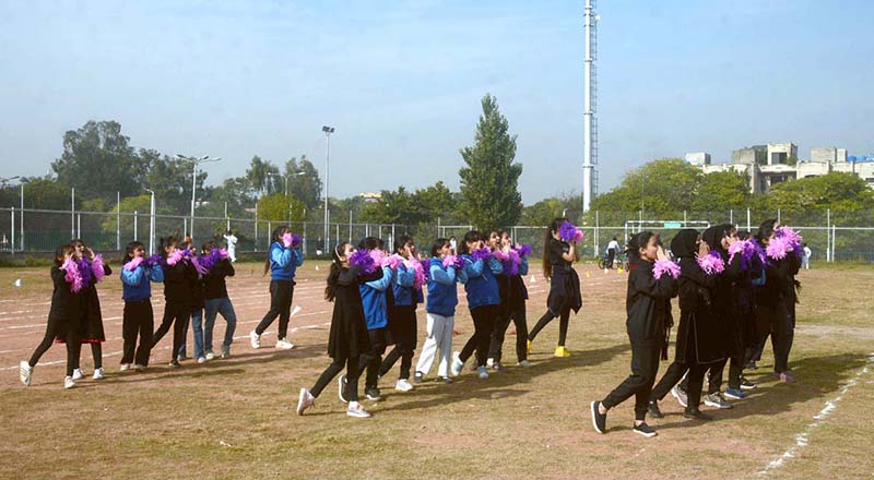 Students participate in tableau during the opening session of Annual Sports Day 2023 of Islamabad Grammer School at Multipurpose Ground G-11/3