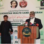 Balochistan Caretaker Chief Minister Mir Ali Mardan Domki handing over health card to a citizen after launching of Balochistan Health Card at CM Secretariat.