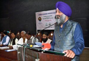 Lecturer Dr. Kalyan Singh addressing a seminar regarding “Interfaith Dialogue” in collaboration with the Punjab Higher Education Commission at The Women's University Multan. 