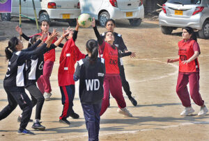 A view of netball match played between Pigged Memorial Girls Higher Secondary School and Government Girls High School Latifabad teams during PNF Netball Cup 2023 at Shah Latif Girls College.