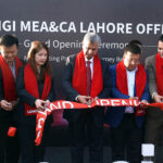 Caretaker Federal Minister for Information and Broadcasting Murtaza Solangi is cutting the ribbon to inaugurate Longi Solar's at Gulberg