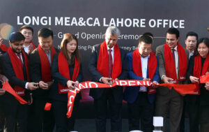 Caretaker Federal Minister for Information and Broadcasting Murtaza Solangi is cutting the ribbon to inaugurate Longi Solar's at Gulberg