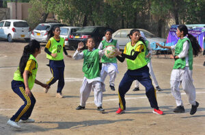 A view of netball match played between Pigged Memorial Girls Higher Secondary School and Government Girls High School Latifabad teams during PNF Netball Cup 2023 at Shah Latif Girls College.