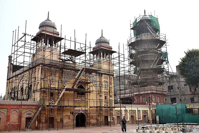 Labourers busy in renovation work at historical Mosque Masjid Wazir Khan at Walled City. The Wazir Khan Mosque is 17th century. The mosque was commissioned during the reign of the Mughal Emperor Shah Jahan as part of an ensemble of buildings that also included the nearby Shahi Hammam baths. Construction of Wazir Khan Mosque began in 1634 C.E., and was completed in 1641