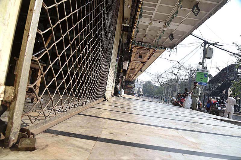 A view of closed shops at Mall Road as Punjab government has ordered markets to remain closed over the weekend in the hope that the long weekend will help cut toxic levels of smog