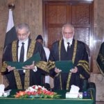 The Honorable Chief Justice of Pakistan Justice Qazi Faez Isa administering the oath of office to Honorable Justice Irfan Saadat Khan, Acting Chief Justice of the High Court of Sindh as Judge of the Supreme Court of Pakistan at the Supreme Court