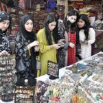 Women visiting stall during “Folk Festival Lok Mela” at Lok Virsa.