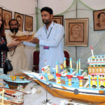 Woman visiting stall during “Folk Festival Lok Mela” at Lok Virsa.