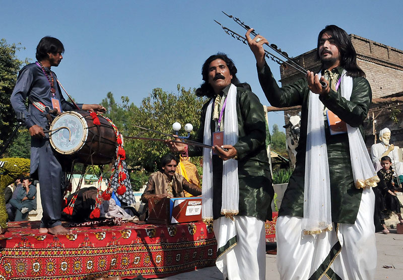 Woman visiting stall during “Folk Festival Lok Mela” at Lok Virsa.