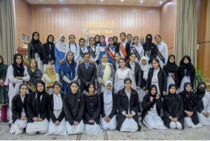 Students of Islamabad Model College poses for a group photo with Dr Sultan Temuri and Halena Iqbal in a seminar, organized by International Governance and Sustainability Institute