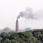 A view of smoke emitting from a kiln at bypass road creates environmental problems and needs attention to the concerned authorities to control smog in the city