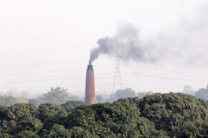 A view of smoke emitting from a kiln at bypass road creates environmental problems and needs attention to the concerned authorities to control smog in the city
