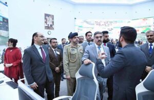 Caretaker Prime Minister Anwaar-ul-Haq Kakar interacting with team members and officers during his visit to National Emergency Operation Centre
