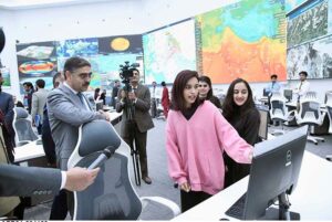 Caretaker Prime Minister Anwaar-ul-Haq Kakar interacting with team members and officers during his visit to National Emergency Operation Centre