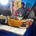 A shopkeeper preparing popular traditional food Soop.