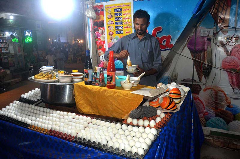 A shopkeeper preparing popular traditional food Soop.