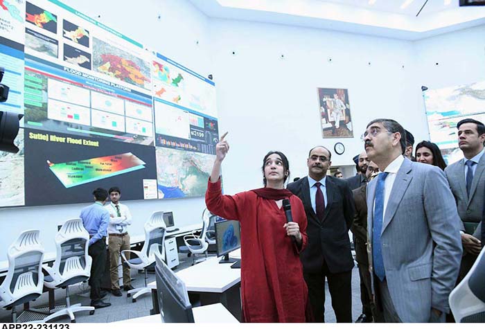 Caretaker Prime Minister Anwaar-ul-Haq Kakar interacting with team members and officers during his visit to National Emergency Operation Centre