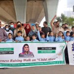 Civil Society and students participating in an awareness walk on Child Abuse organized by Child Protection and Welfare Bureau