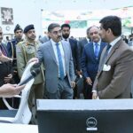 Caretaker Prime Minister Anwaar-ul-Haq Kakar interacting with team members and officers during his visit to National Emergency Operation Centre.