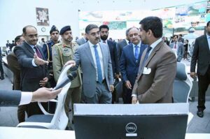 Caretaker Prime Minister Anwaar-ul-Haq Kakar interacting with team members and officers during his visit to National Emergency Operation Centre.