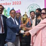 DPI Colleges Punjab, Dr. Syed Ansar Azhar giving trophy to student during 2nd (HED) higher education sports event District Level
