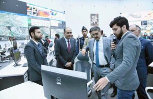 Caretaker Prime Minister Anwaar-ul-Haq Kakar interacting with team members and officers during his visit to National Emergency Operation Centre.