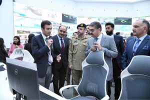 Caretaker Prime Minister Anwaar-ul-Haq Kakar interacting with team members and officers during his visit to National Emergency Operation Centre.